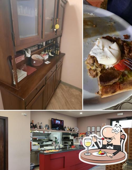 Tra le varie cose da Royal Ristorante Pizzeria si possono trovare la cibo e interni