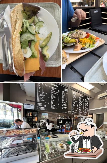 Dai un’occhiata alla foto che presenta la cibo e interni di Eva' Sandwich House