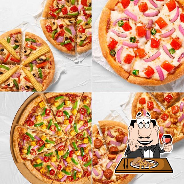 Pick pizza at Pizza Hut Cargo Hub Delhi Airport, Delhi