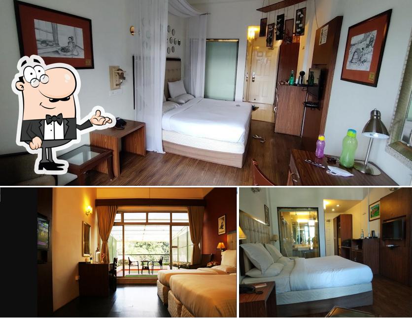 Take a seat at one of the tables at Orchid Square Boutique Hotel