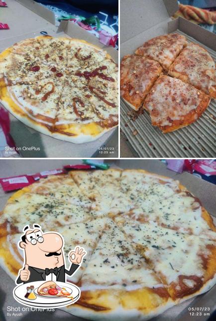 Get pizza at Olive's Kitchen