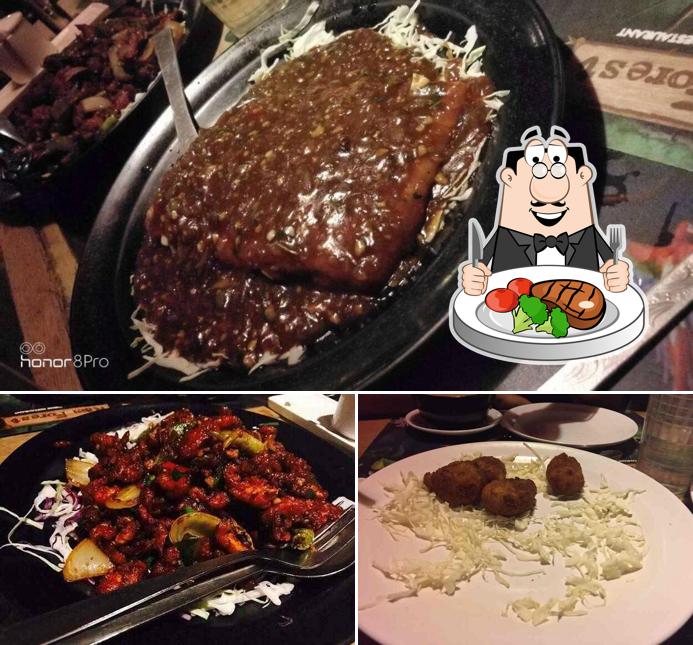 Order meat dishes at Rain Forest