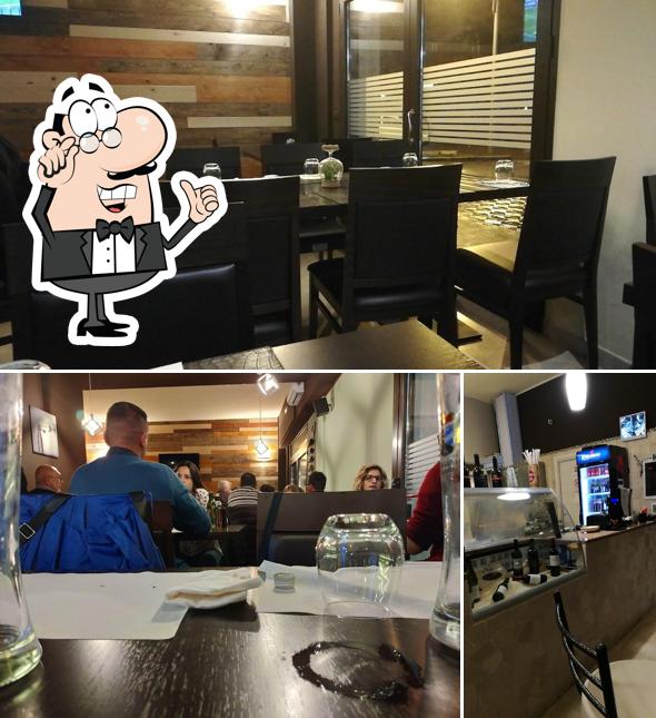 Dai un'occhiata agli interni di Authentico Pizzeria
