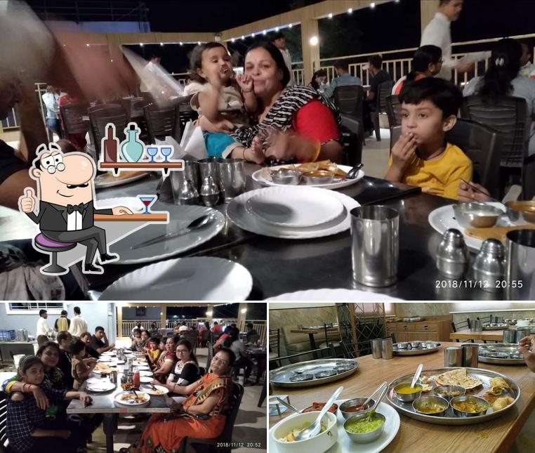 Take a look at the picture depicting interior and food at DreamLand Restaurant