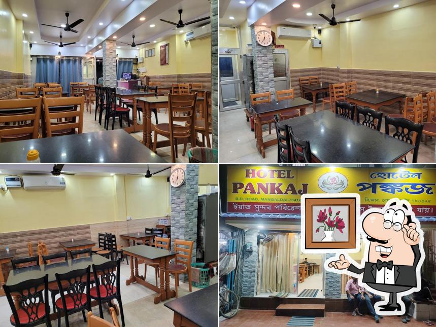 Take a seat at one of the tables at Pankaj Hotel
