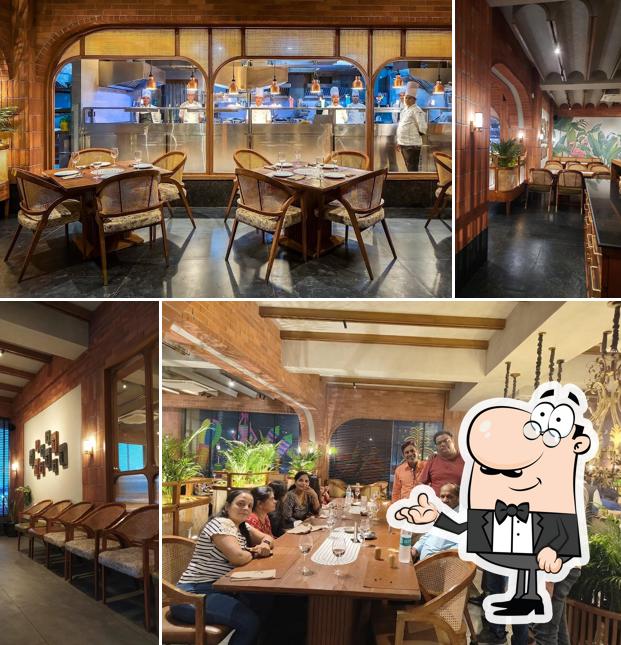 Take a seat at one of the tables at Megma Restaurant & Banquets