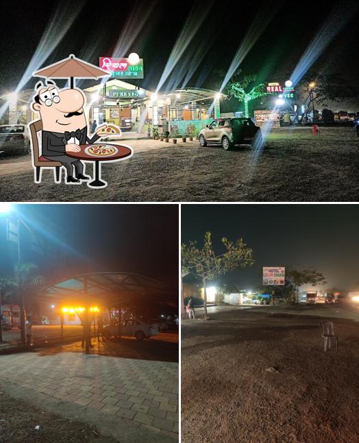 Enjoy the view at the outside area of HOTEL REAL GARDEN PURE VEG