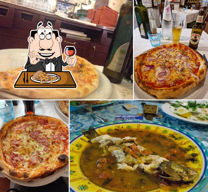 A Trattoria Pizzeria La Mela, puoi provare una bella pizza