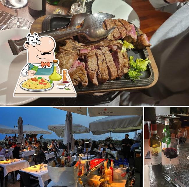 La immagine di cibo e vino da Patanegra Boccadasse