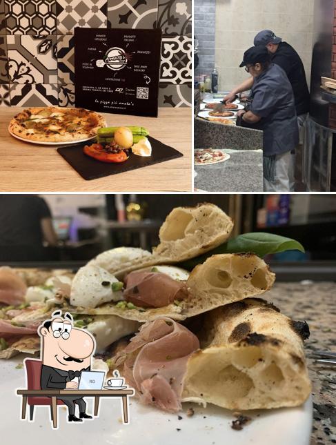 Dai un'occhiata agli interni di Amata's Pizza