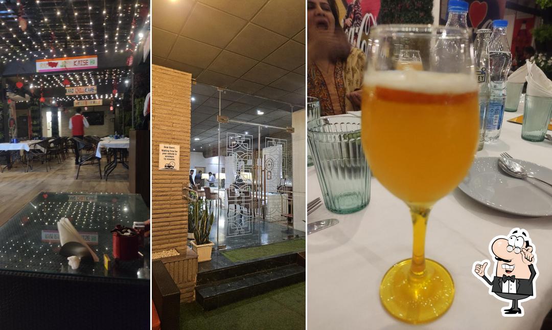 Take a seat at one of the tables at Bablu da Dhaba-Airport Centre Point