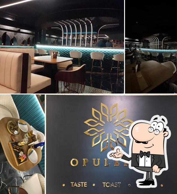 Take a seat at one of the tables at Opulence