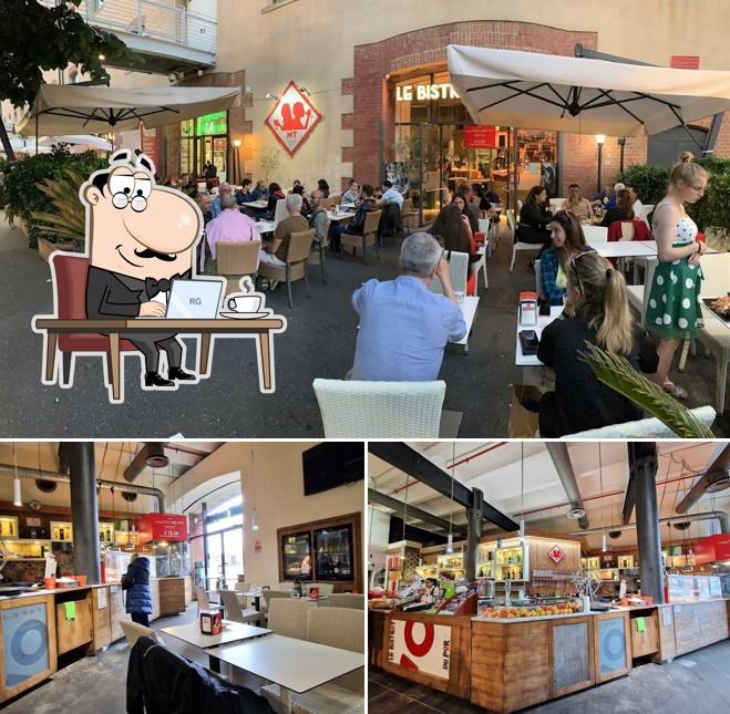 Siediti a un tavolo di Le Bistrot Du Port