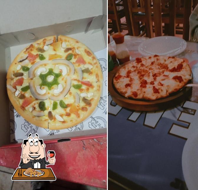 Get pizza at Dine N Delight - Cafe & Restaurant