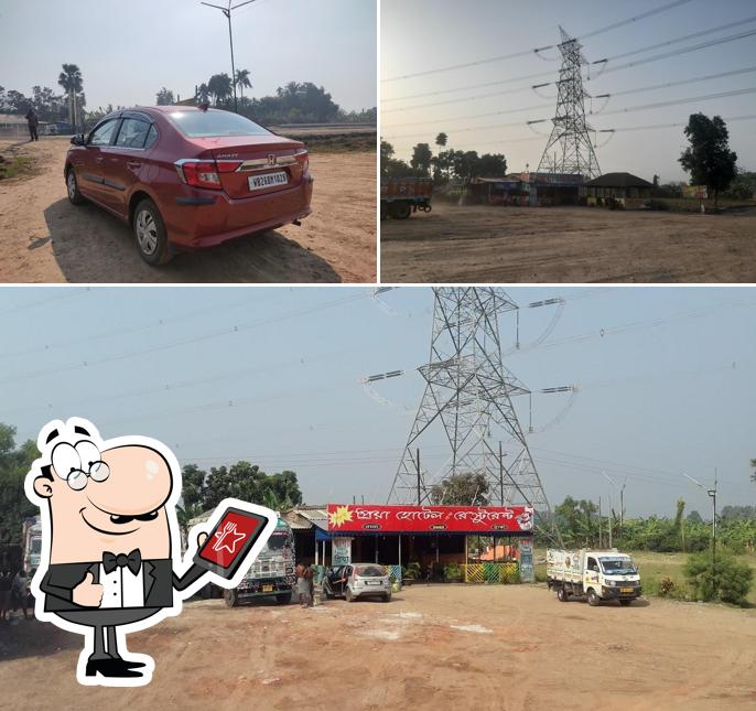 Check out how New Priya Hotel & Restaurant looks outside