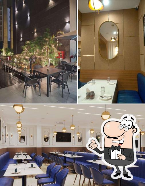 Take a seat at one of the tables at Cream Centre - Vegetarian Legacy Since 1958