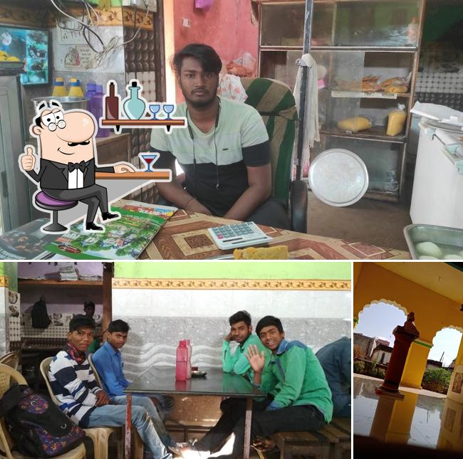 Take a seat at one of the tables at Hotel Jagabalia(ଜଗାବଳିଆ ହୋଟେଲ୍)