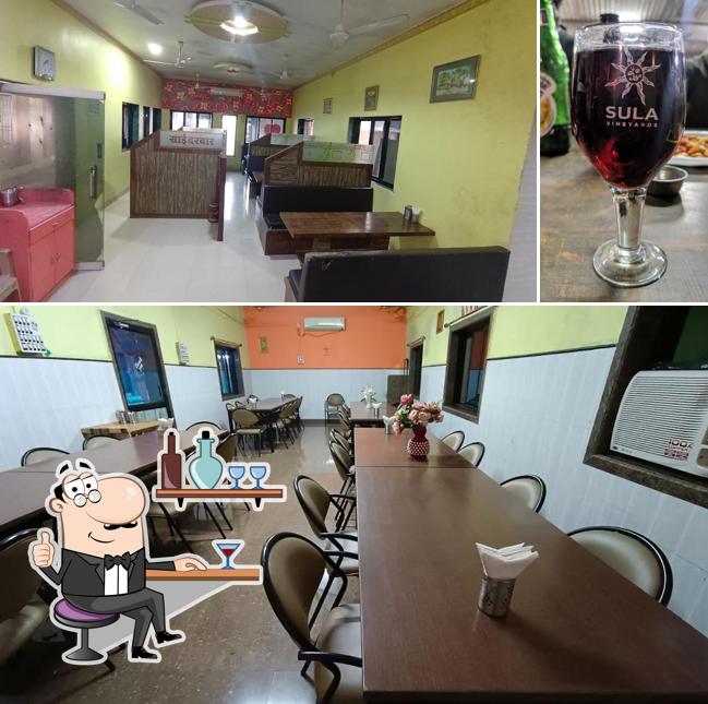 The photo of interior and alcohol at Hotel Sai Darbar
