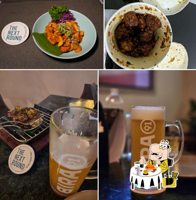 Among various things one can find food and drink at Next Round Bar & Kitchen