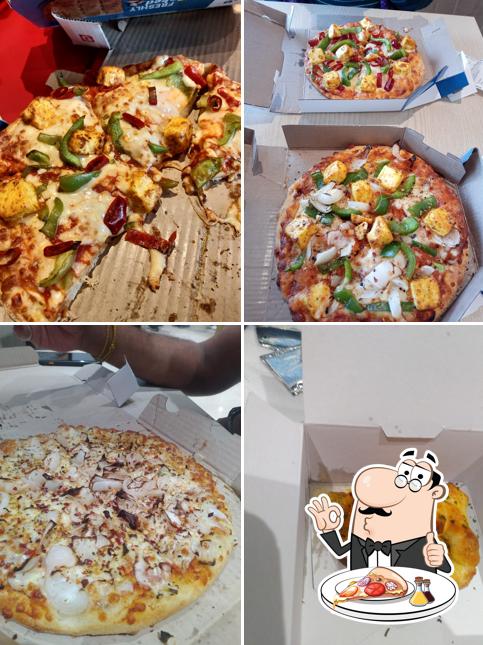 Try out pizza at Domino's Pizza Mulshi, Pune