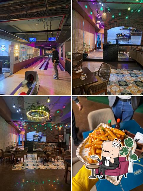 Take a seat at one of the tables at Mashup - Sports Bar and Night Club