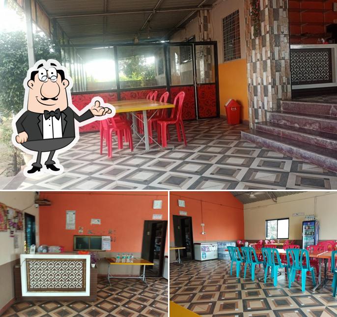 The interior of Hotel Sai Pure Veg & Family Garden