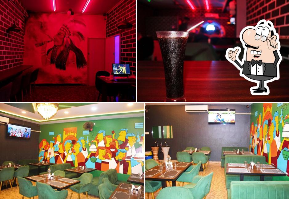 Take a seat at one of the tables at AJ Cafe and Restaurant