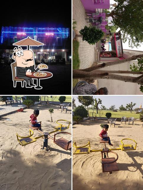 The picture of exterior and play area at Nikita Hotel & Restaurant