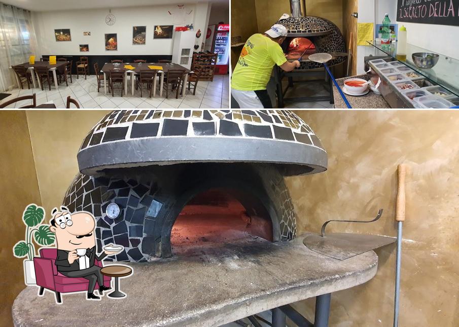 Dai un'occhiata agli interni di Pizzeria Cuore d'Oro-Pizza Latinense