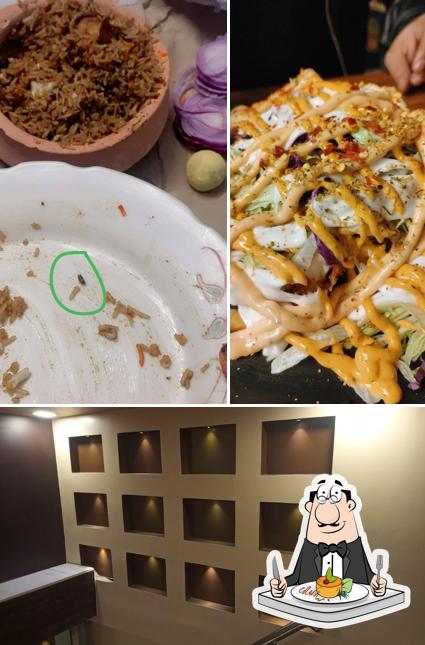 Among various things one can find food and interior at Yahi Cafe & Restro