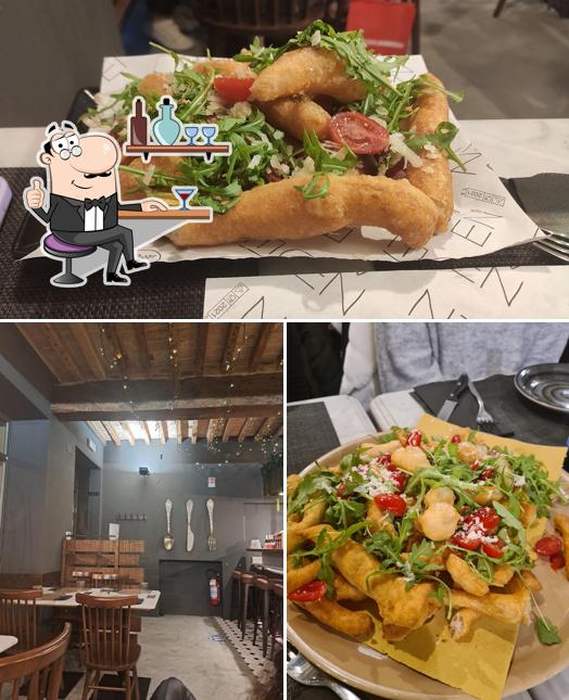 Tra le diverse cose da Oven Parma si possono trovare la interni e cibo