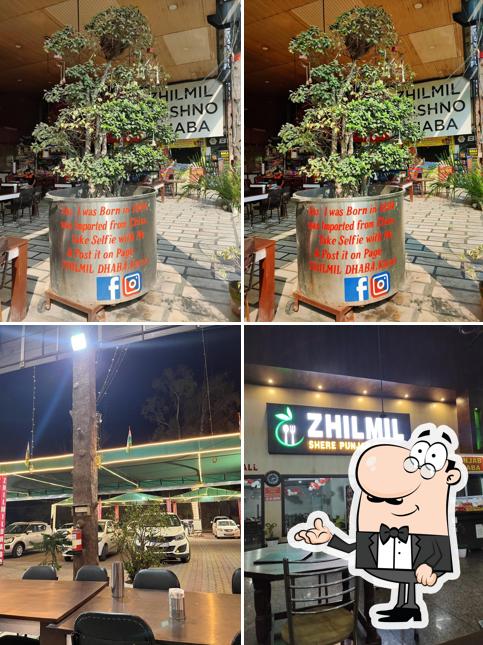 Take a seat at one of the tables at Jhilmil Garden