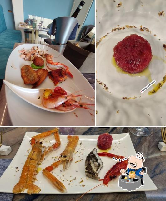 Questa è la immagine che mostra la cibo e interni di ABISSI Restaurant & More