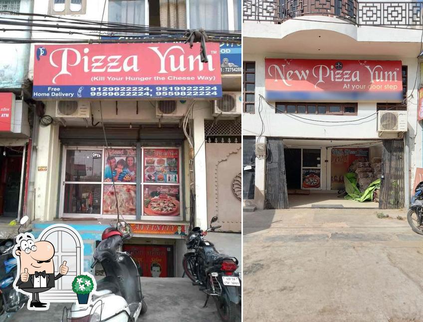 The exterior of New Pizza Yum