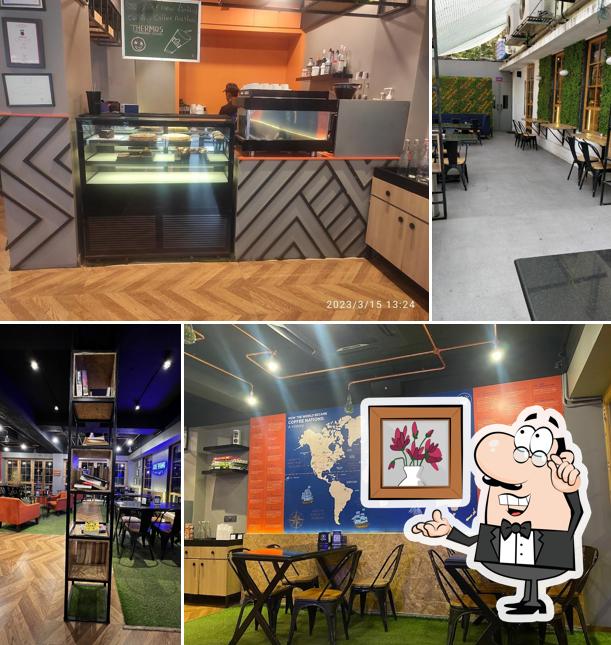 Take a seat at one of the tables at Coffee Nation FC Road