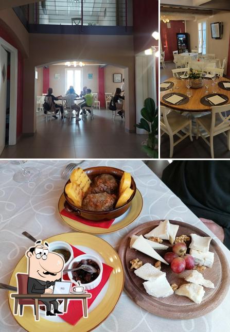 La foto della interni e cibo di Osteria da Nadia