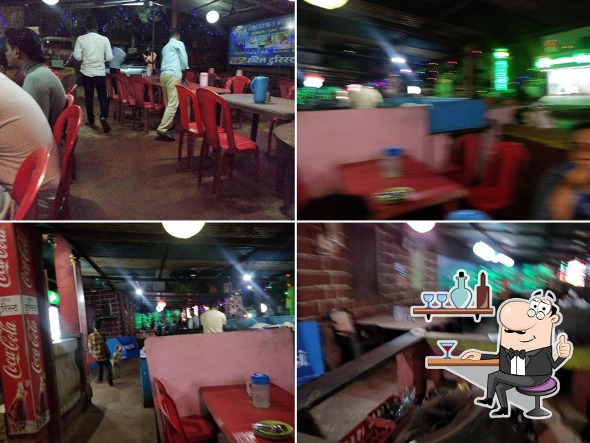 Take a seat at one of the tables at Hotel Tourist