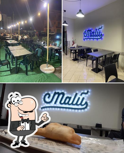 Guarda la immagine che mostra la interni e cibo di Malù - La Focacceria
