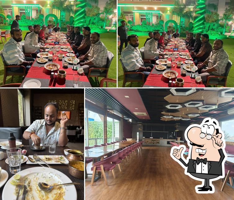 Check out how The Grand Turf Pure Vegetarian Family Restaurant looks inside