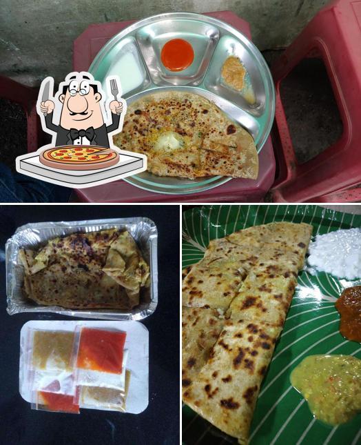 Try out pizza at Aayushi Paratha Center