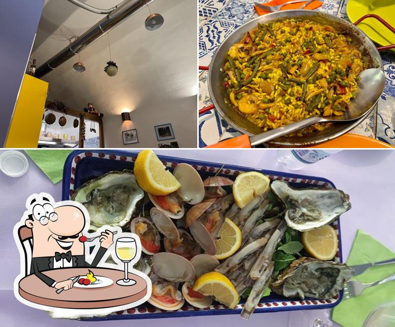 La immagine della cibo e interni di Taverna Pesciolì