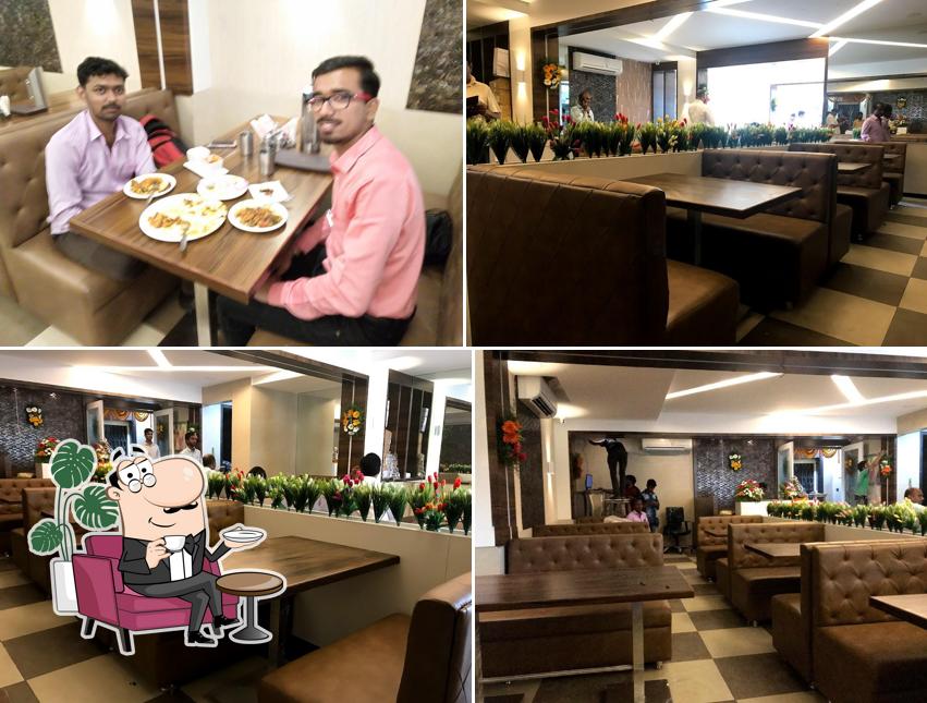 Take a seat at one of the tables at Santosh Dhaba Exclusive