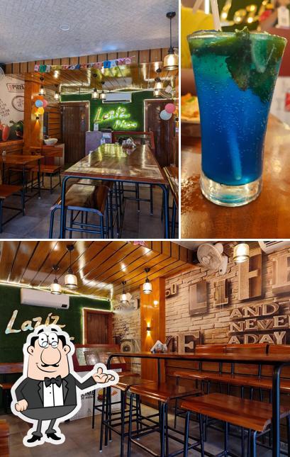 Check out the photo showing interior and alcohol at Laziz Pizza_Rasulgarh