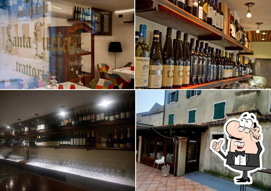 Siediti a un tavolo di Trattoria Pizzeria Santa Lucia