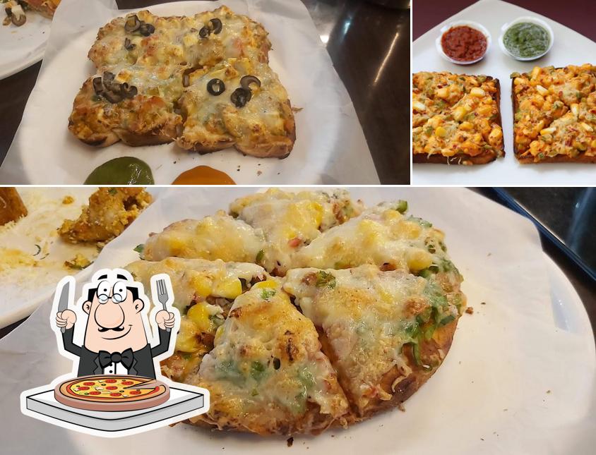 Try out pizza at Bliss Veg Resto