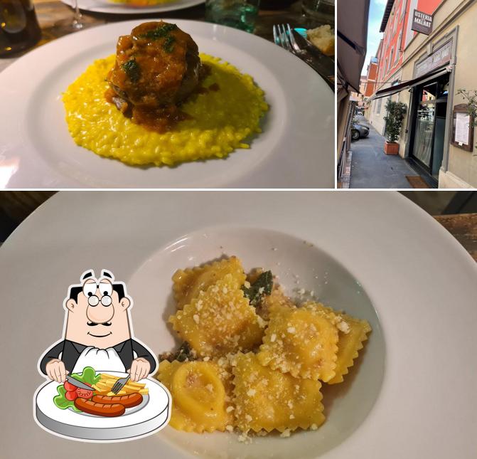 Osteria dei Malnat si caratterizza per la cibo e esterno