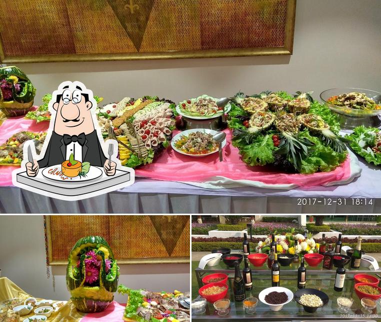 Check out the photo displaying food and alcohol at Temple Cafe