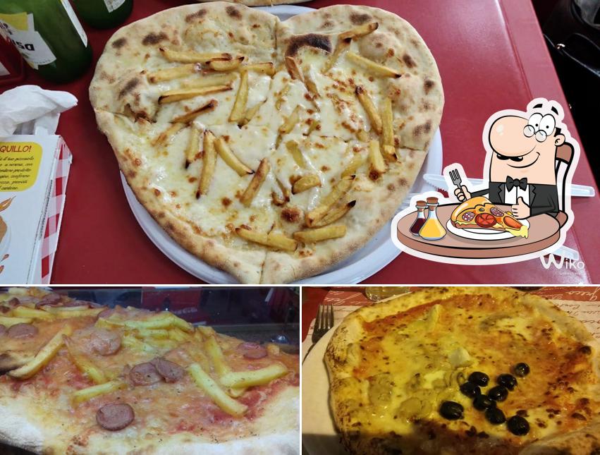 A Pizzeria La Tigella, puoi provare una bella pizza