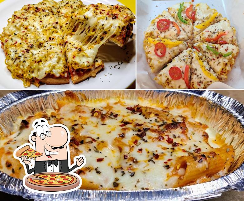 Try out pizza at Pawri Kitchen - Pure Veg