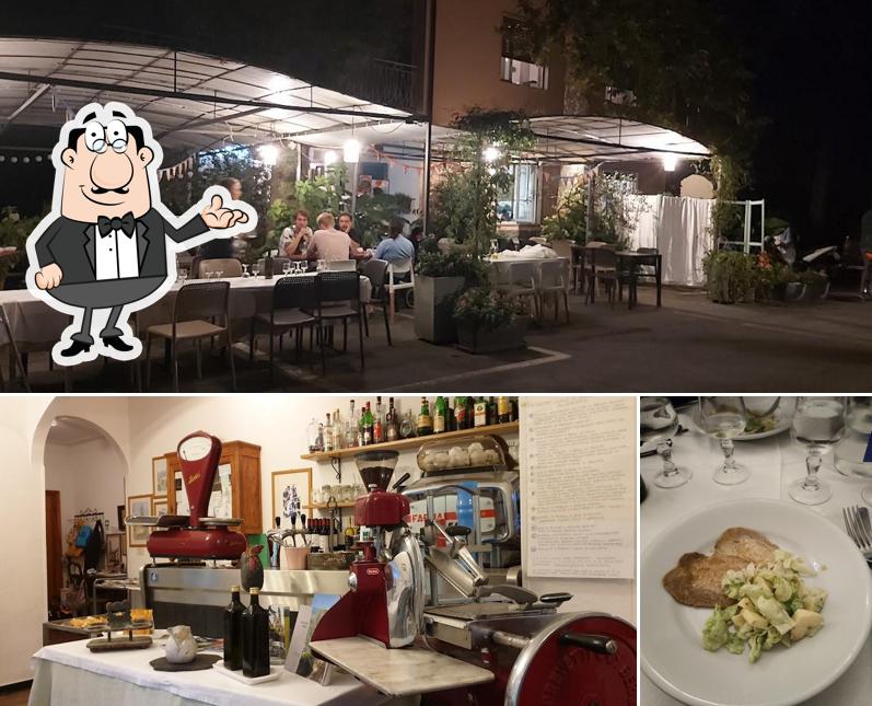 La interni e tavolo da pranzo del ristorante